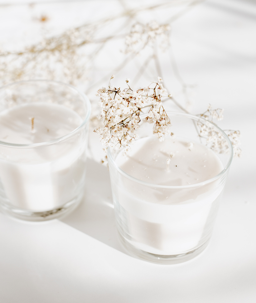 Glasses of Candles with Fresh Flowers